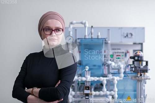 Image of portrait of muslim female student in the electronic classroom