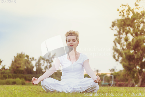 Image of woman doing yoga exercise