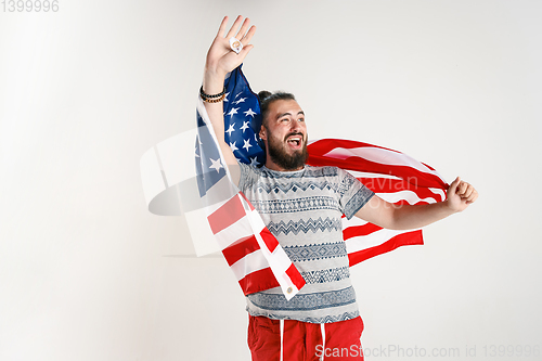 Image of Young man with the flag of United States of America