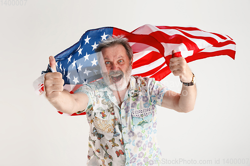 Image of Senior man with the flag of United States of America