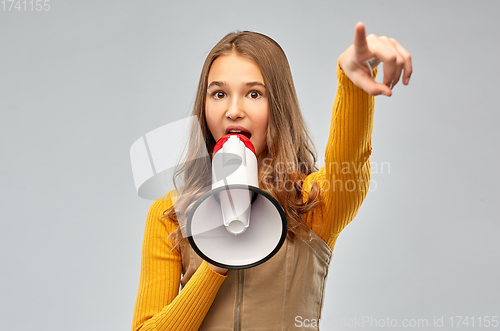 Image of teenage girl speaking to megaphone