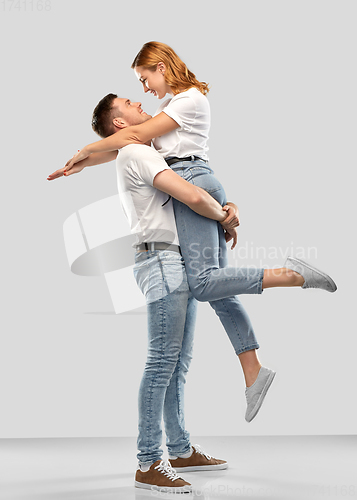 Image of happy couple in white t-shirts