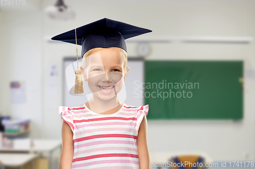 Image of happy girl in bachelor hat or mortarboard