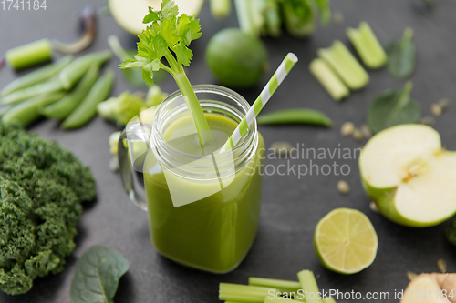 Image of close up of glass mug with green vegetable juice