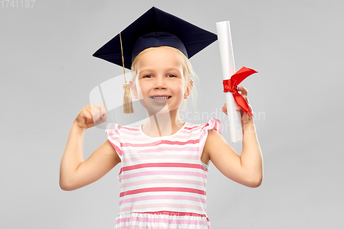 Image of little girl in mortarboard with diploma