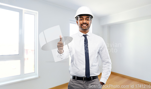 Image of indian male architect in helmet showing thumbs up