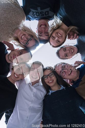 Image of students celebrating successfully finished project