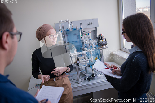 Image of young students doing practice in the electronic classroom