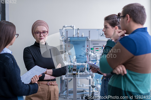 Image of young students doing practice in the electronic classroom