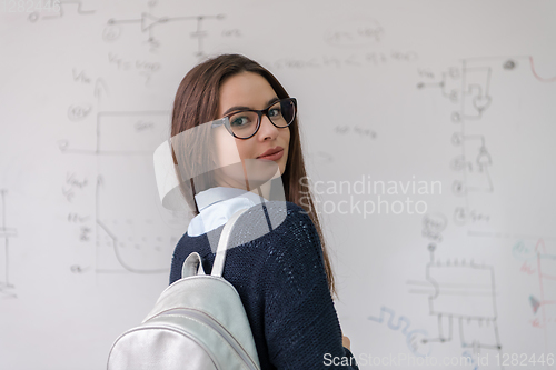 Image of portrait of a young beautiful female student