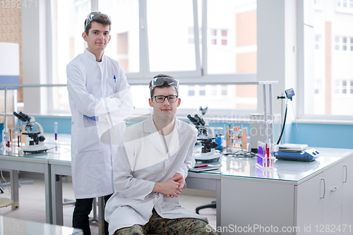 Image of Group of young medical students doing research