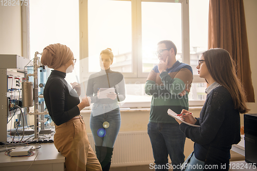 Image of young students doing practice in the electronic classroom