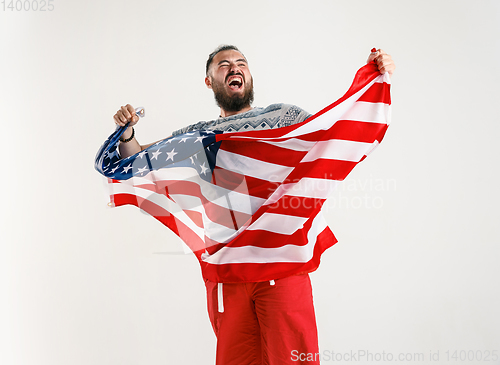 Image of Young man with the flag of United States of America