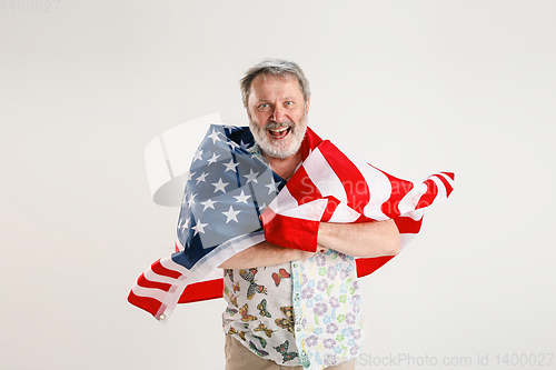 Image of Senior man with the flag of United States of America