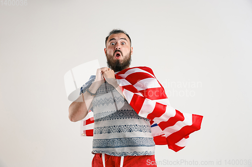 Image of Young man with the flag of United States of America