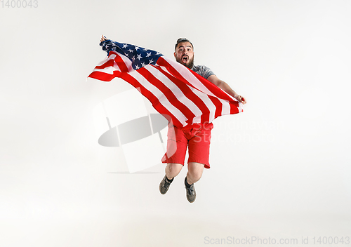 Image of Young man with the flag of United States of America