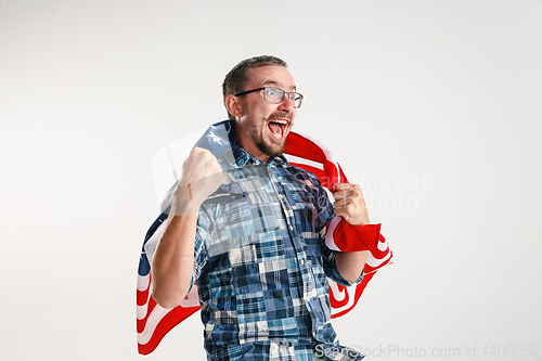 Image of Young man with the flag of United States of America