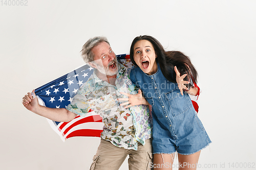 Image of Senior man with the flag of United States of America