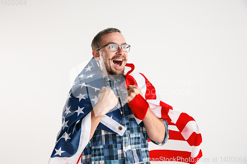 Image of Young man with the flag of United States of America