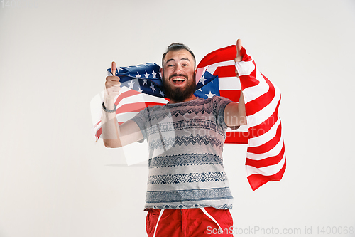 Image of Young man with the flag of United States of America