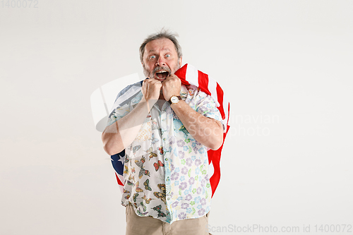 Image of Senior man with the flag of United States of America