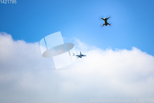 Image of toy drone and airplane blue sky background 