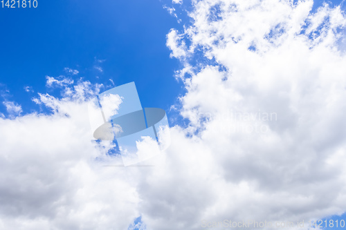 Image of blue sky with hugh white cloud background