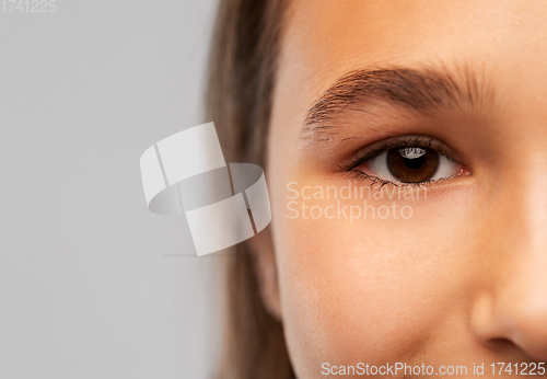 Image of close up of teenage girl face with brown eyes