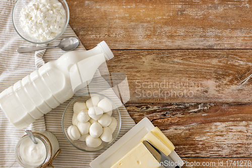 Image of bottle of milk, yogurt, cottage cheese and butter