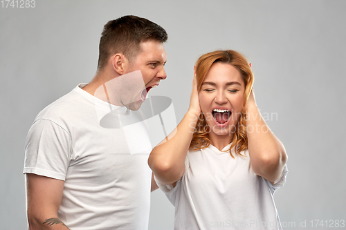 Image of unhappy couple having argument