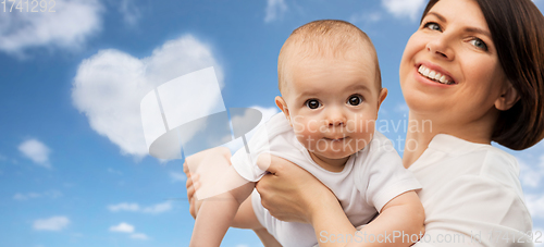 Image of happy middle-aged mother with little baby daughter