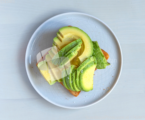 Image of toasted bread with sliced avocado