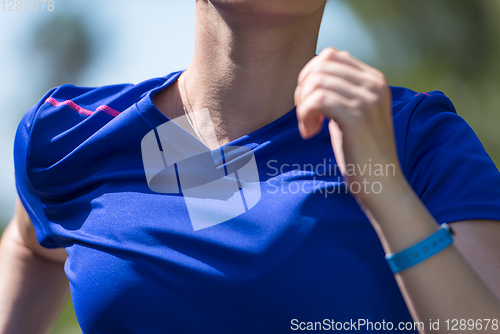 Image of young female runner training for marathon