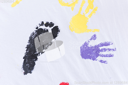 Image of colorful hands and foots print