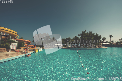 Image of tropical swimming pool in hotel resort