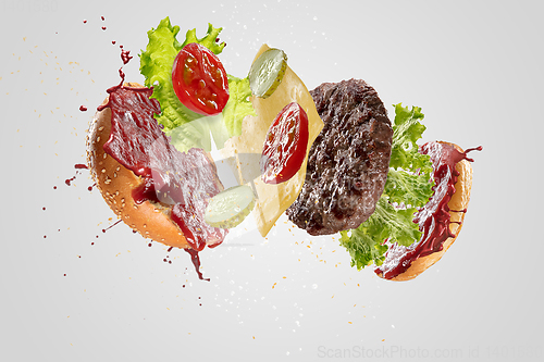 Image of Burger\'s crashing isolated on white background