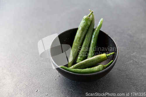 Image of close up of green chili peppers in bowl