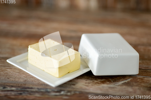 Image of close up of butter on wooden table