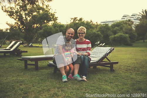 Image of portrait of young happy family