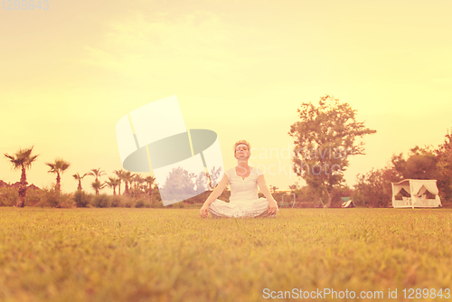 Image of woman doing yoga exercise