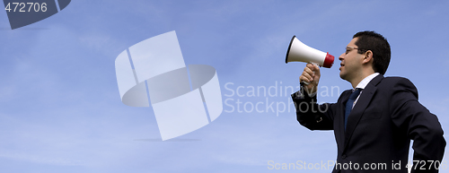 Image of Businessman speaking with a megaphone