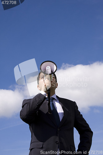 Image of Businessman speaking with a megaphone