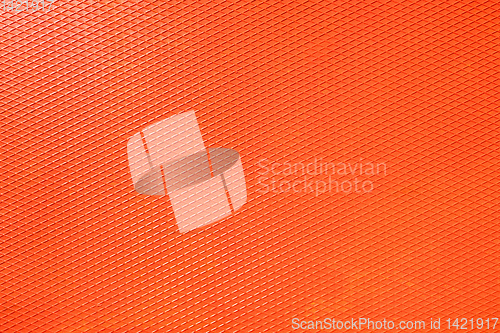 Image of an orange diamond metal plate