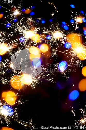 Image of festive sparkler bokeh background