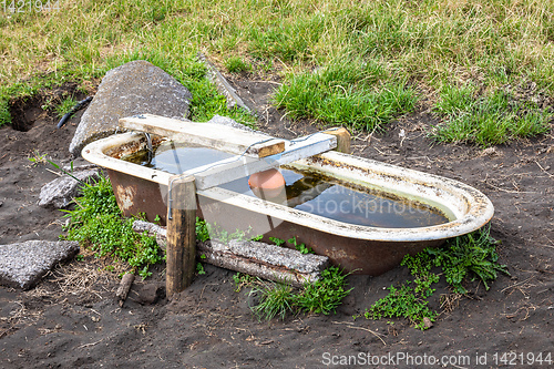 Image of an old tub for animals potions