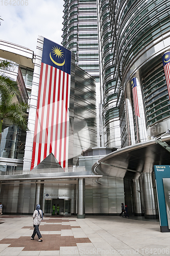 Image of Large Malaysian flag on Petronas Twin Towers facade.