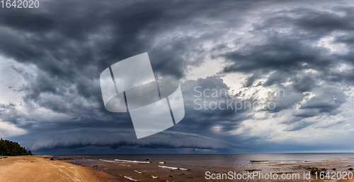 Image of Dramatic Storm Clouds over sea