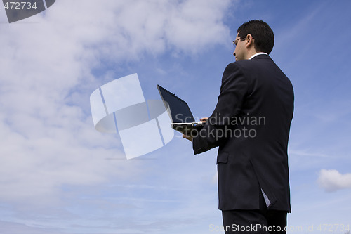 Image of Businessman with a laptop