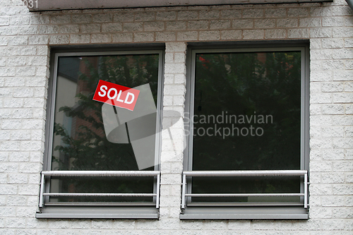 Image of Sold sticker in window