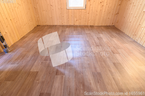 Image of Linoleum laid on the floor in a small room of a country house